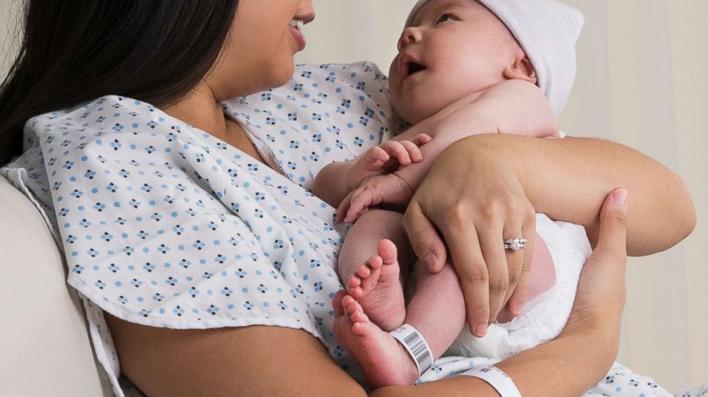 PHOTO: A mother holds her newborn baby in a hospital in this undated stock photo. 