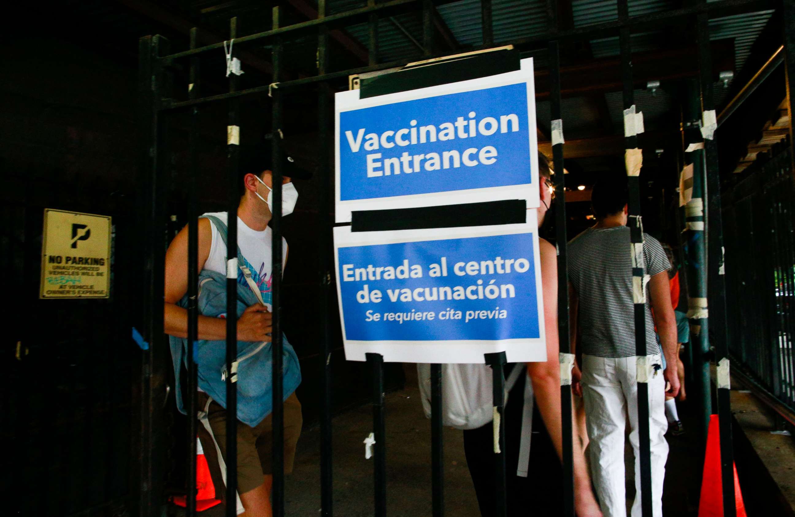 PHOTO: (FILES) In this file photo taken on July 17, 2022 people wait in line to recieve the Monkeypox vaccine before the opening of a new mass vaccination site at the Bushwick Education Campus in Brooklyn in New York City. 