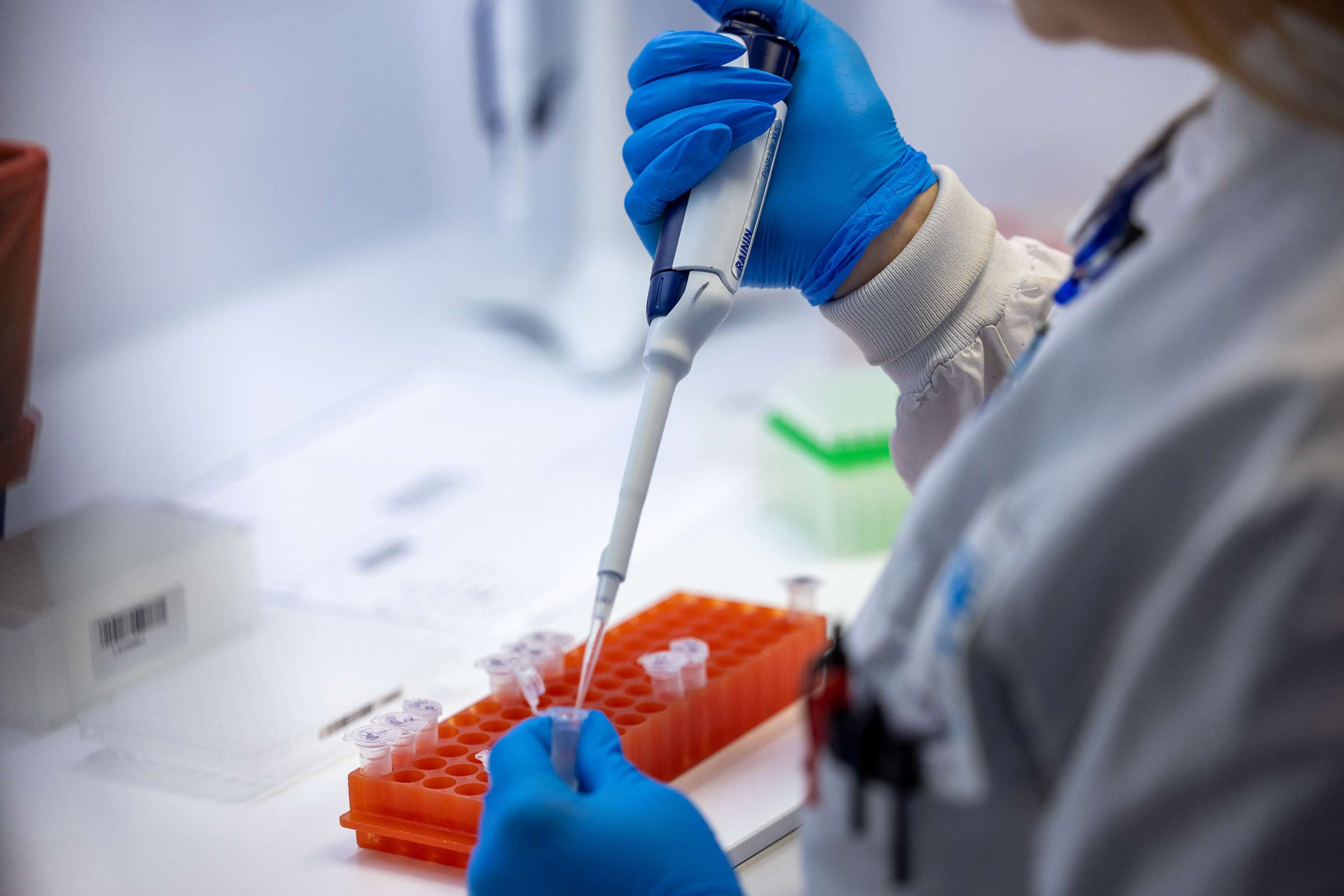 PHOTO: Microbiologists with the AEGIS Sciences Corporation process Covid-19 and Monkeypox tests at its facility in Nashville, Tenn., Aug. 4, 2022. 