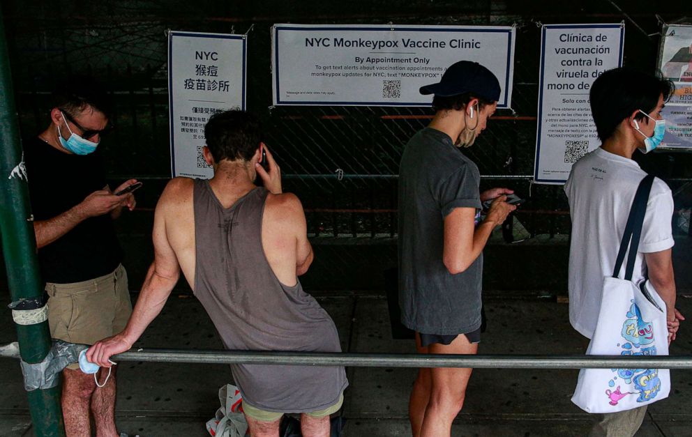 PHOTO: People wait in line to receive the Monkeypox vaccine before the opening of a new mass vaccination site at the Bushwick Education Campus in Brooklyn, New York, July 17, 2022.