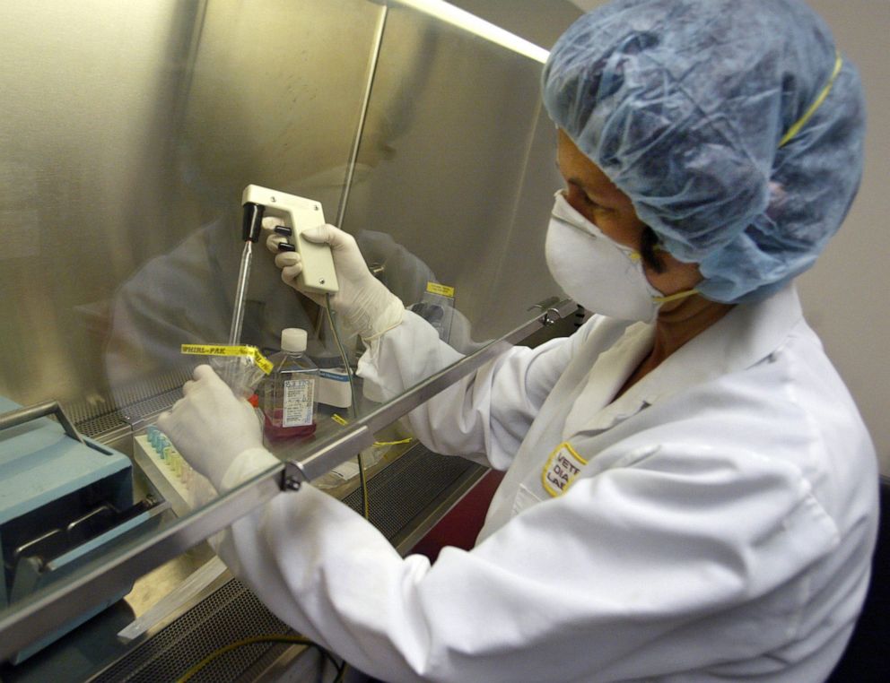 PHOTO: A scientist prepares a sample to test for the monkeypox virus at the University of Minnesota's Veterinary Diagnostic Laboratory in Falcon Heights, Minn., July 31, 2003.