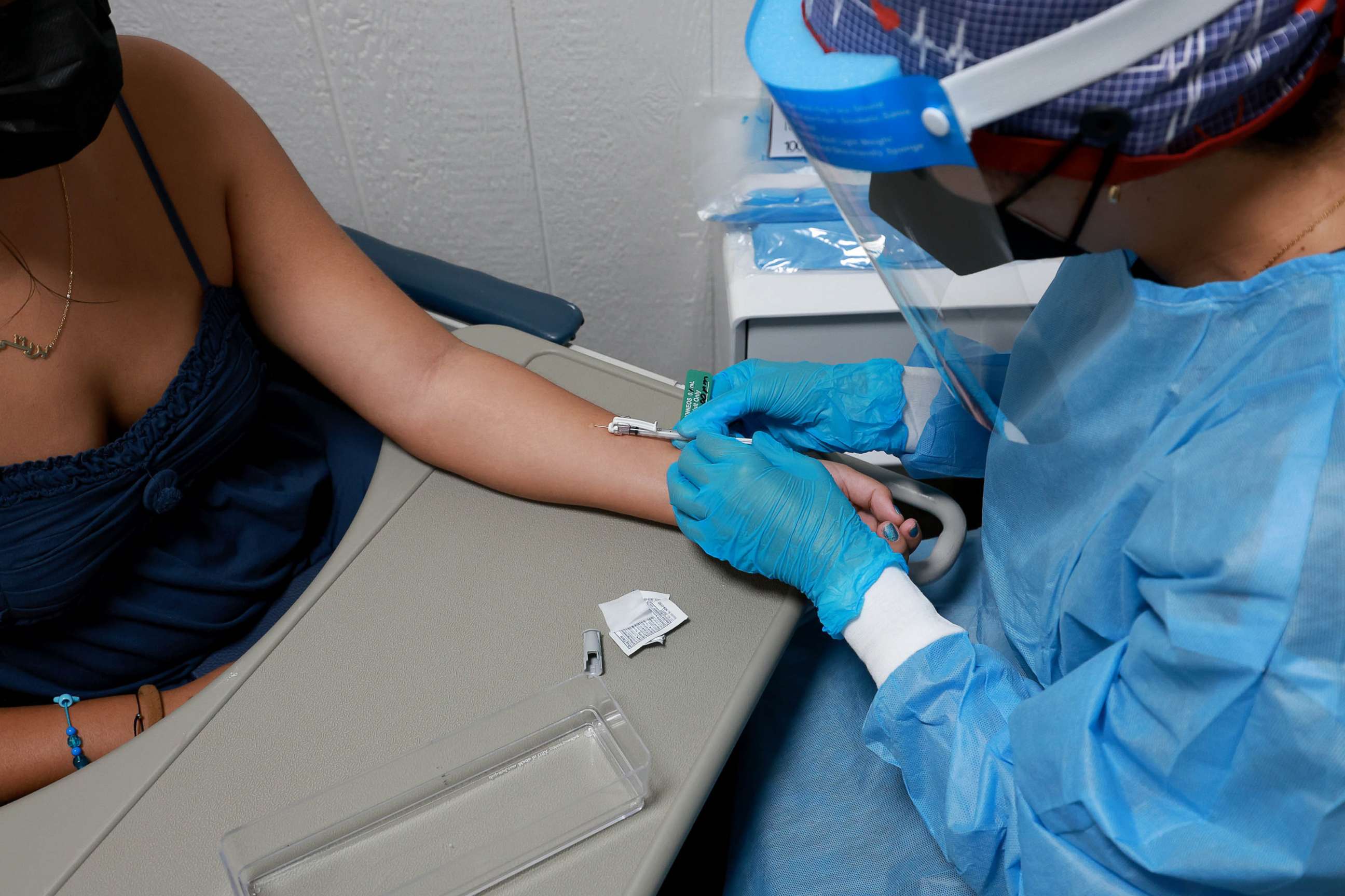PHOTO: FILE - Irina Martinez, a registered nurse, administers an intradermal monkeypox vaccine to Britney Castaneda at a vaccination site setup in Tropical Park by Miami-Dade County and Nomi Health, Aug. 15, 2022 in Miami, Florida.
