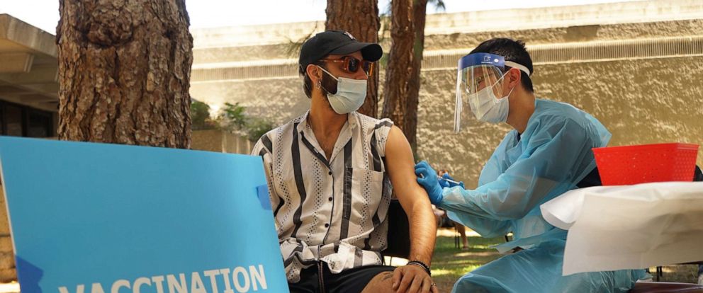PHOTO: In this Aug. 11, 2022, file photo, a medical worker gives a dose of mpox vaccine to a recipient at a mpox vaccination site in Los Angeles.