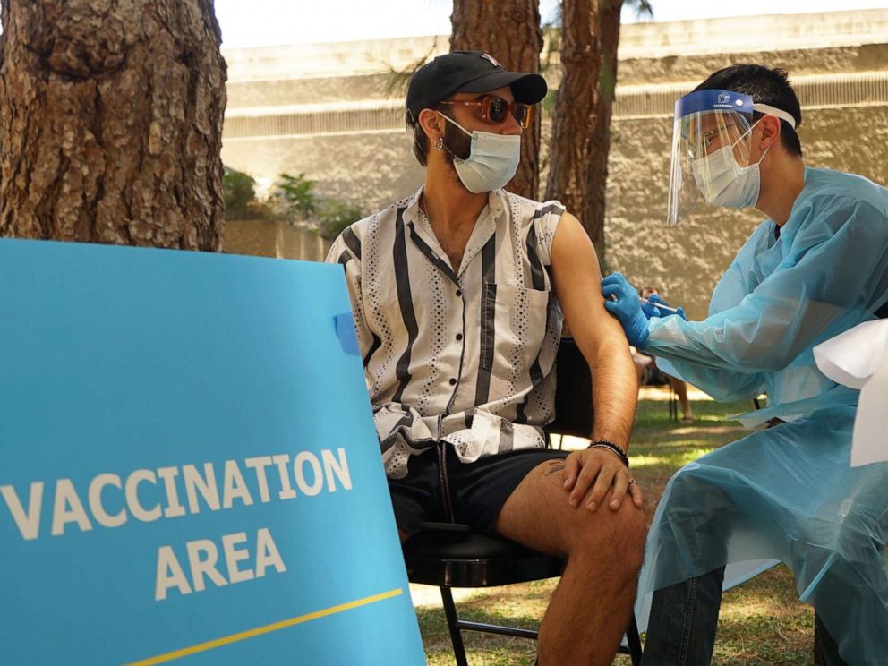 PHOTO: In this Aug. 11, 2022, file photo, a medical worker gives a dose of mpox vaccine to a recipient at a mpox vaccination site in Los Angeles.