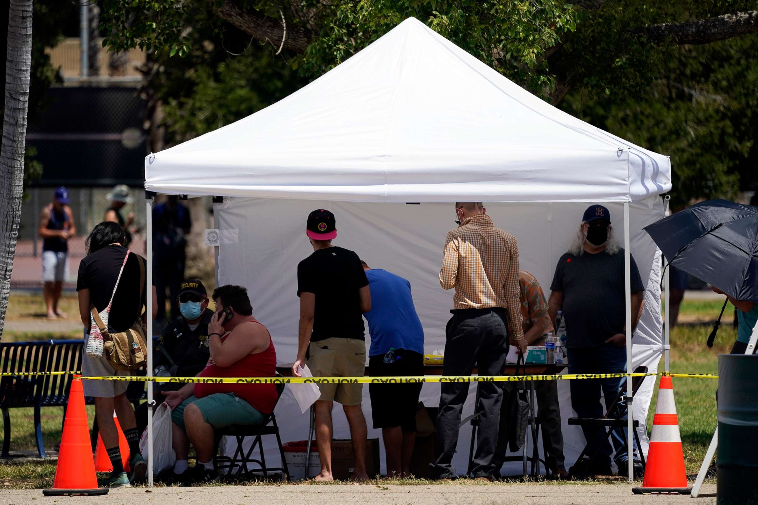 PHOTO: People line up at a monkeypox vaccination site, July 28, 2022, in Encino, Calif.