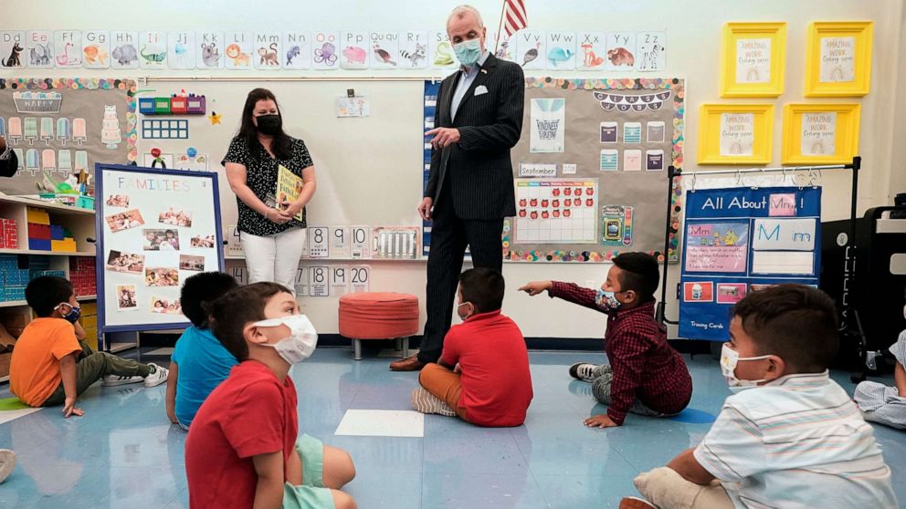 PHOTO: New Jersey Gov. Phil Murphy talks to students in a pre-K class at the Dr. Charles Smith Early Childhood Center, Sept. 16, 2021, in Palisades Park, N.J