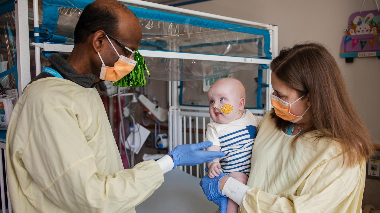Dr. Musunuru and Dr. Ahrens-Nicklas hold KJ post infusion. 