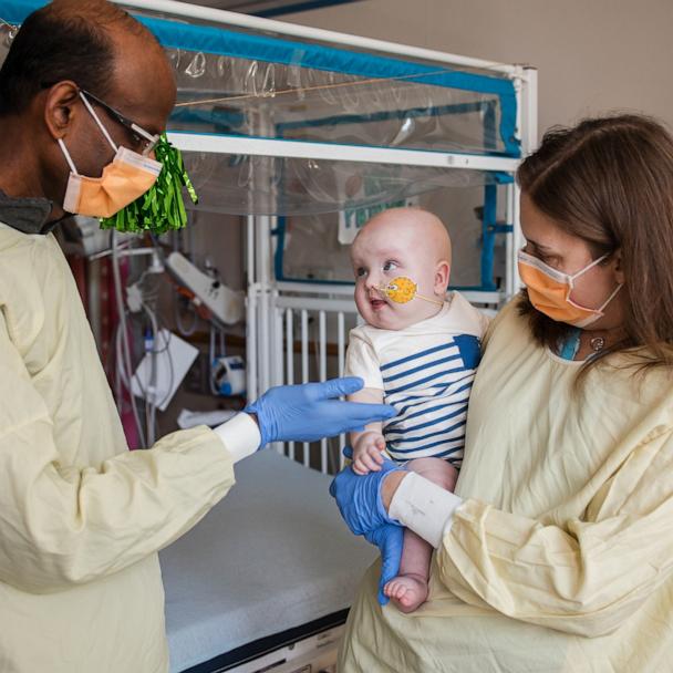Dr. Musunuru and Dr. Ahrens-Nicklas hold KJ post infusion. 