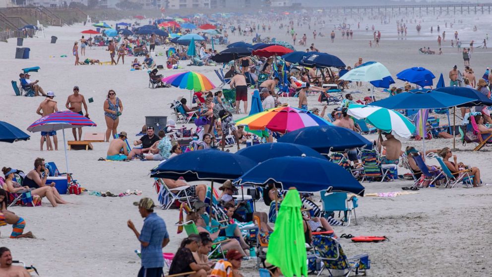 PHOTO: Beachgoers gather in the Cherry Grove section of North Myrtle Beach, S.C., on May 29, 2021.