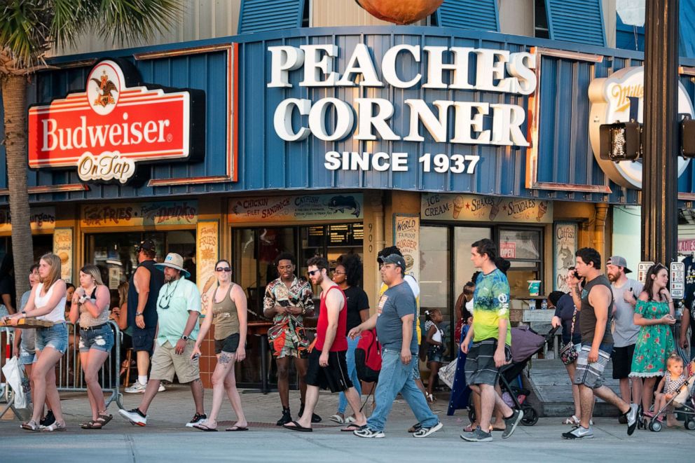 PHOTO: In this May 23, 2020, file photo, people cross N. Ocean Blvd. in Myrtle Beach, S.C.