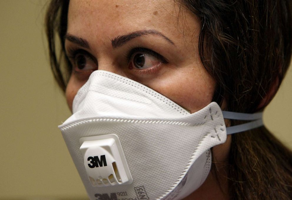 PHOTO: A nurse wears a N95 respiratory mask during a training session, April 28, 2009, in Oakland, Calif.