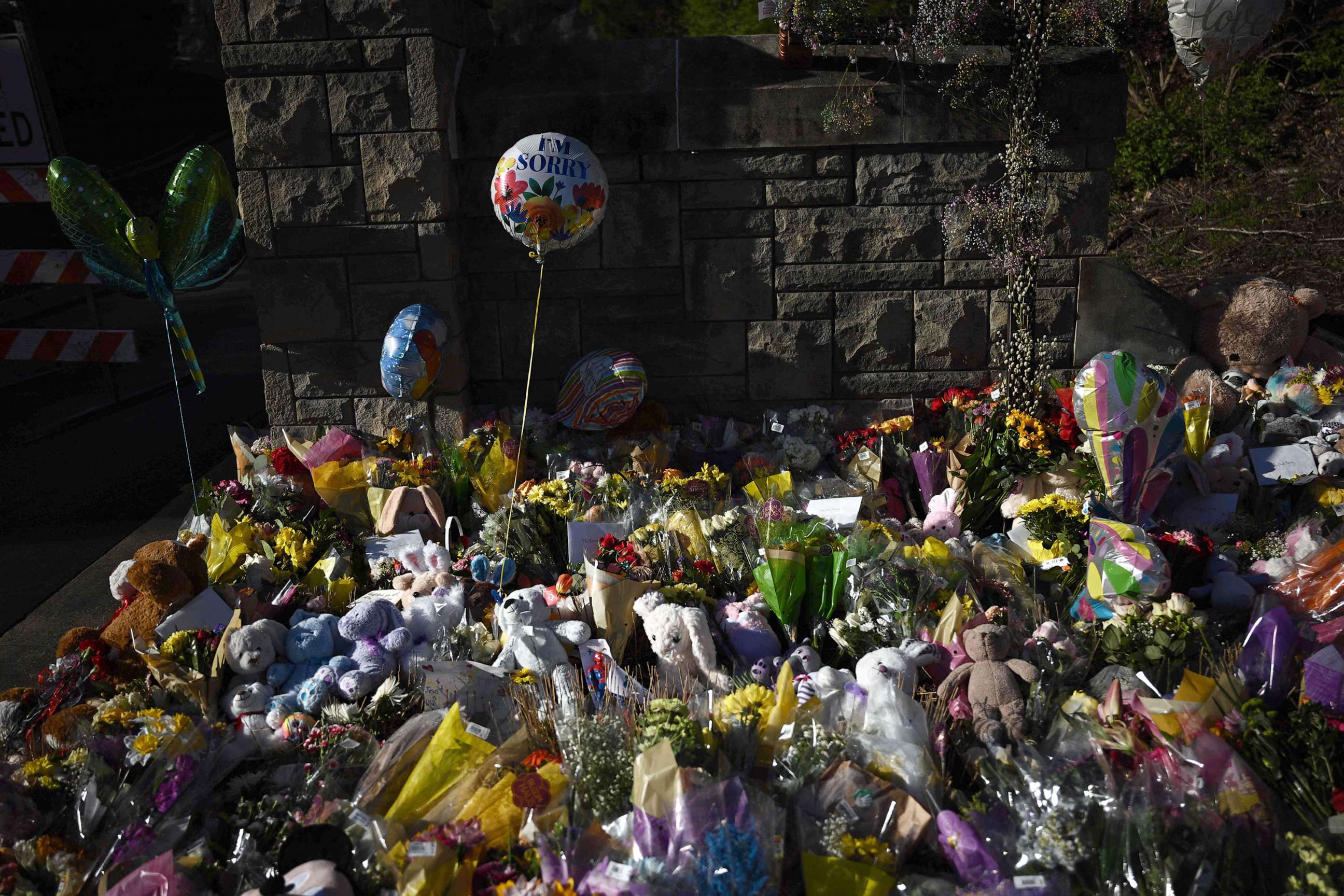 PHOTO: Balloons, flowers and other items left at a makeshift memorial for school shooting victims by the Covenant School building at the Covenant Presbyterian Church in Nashville, Tenn., March 29, 2023.