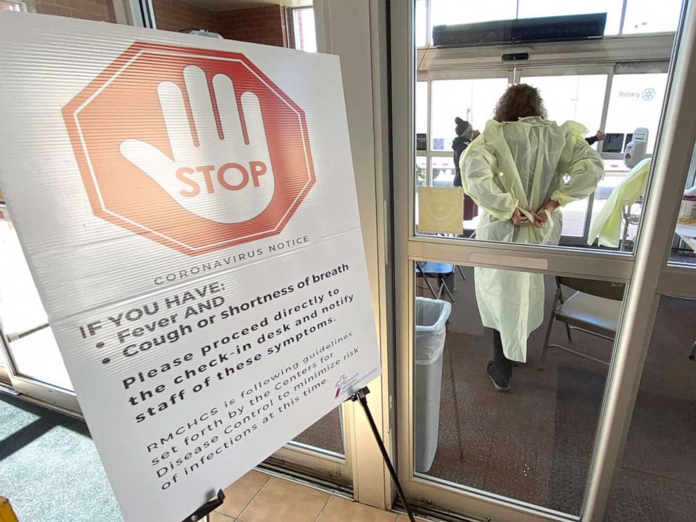 PHOTO: A nurse dons her protective gown as she prepares to diagnose a patient who may have coronavirus disease, at Rehoboth McKinley Christian Hospital on March 13, 2020 in Gallup, N. M. 