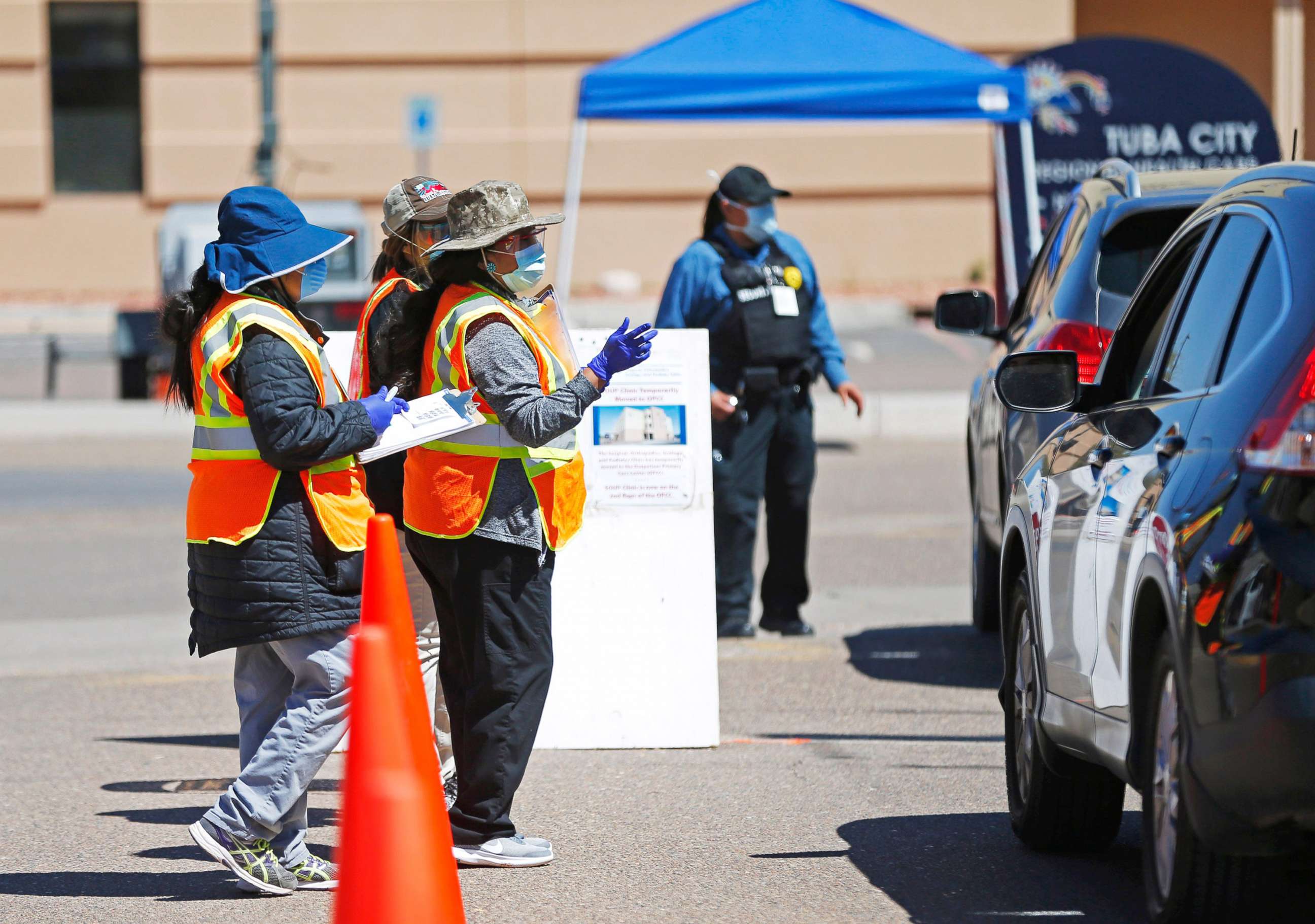 PHOTO: In this file photo, staff at the Tuba City Regional Health Care Center screen people entering their campus  on April 14, 2020. The hospital on Navajo Reservation in Arizona has seen a spike in COVID-19 cases.