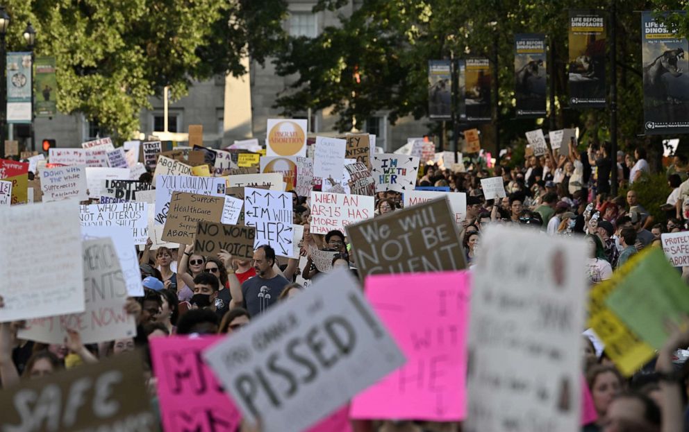 PHOTO: Abortion rights demonstrators gather to protest against the Supreme Court's decision in the Dobbs v Jackson Women's Health case, June 24, 2022 in Raleigh, N.C.