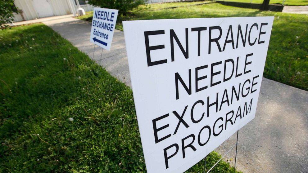 PHOTO: Signs are displayed for the needle exchange program at the Austin Community Outreach Center in Austin, Ind., April 21, 2015.
