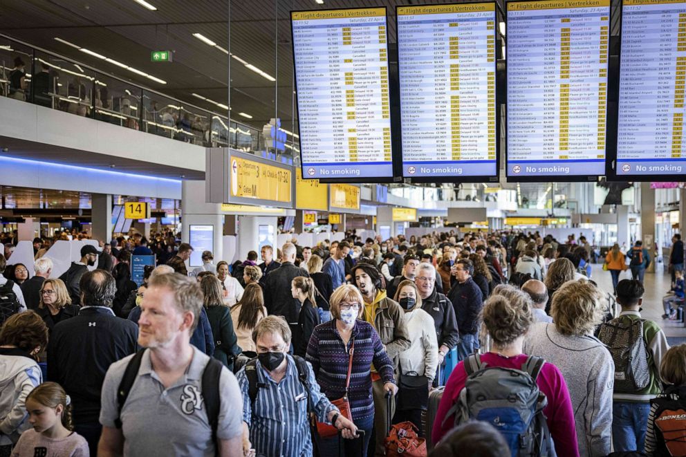 PHOTO: Travelers wait in a departure hall of Schiphol airport in Amsterdam, on April 23, 2022.