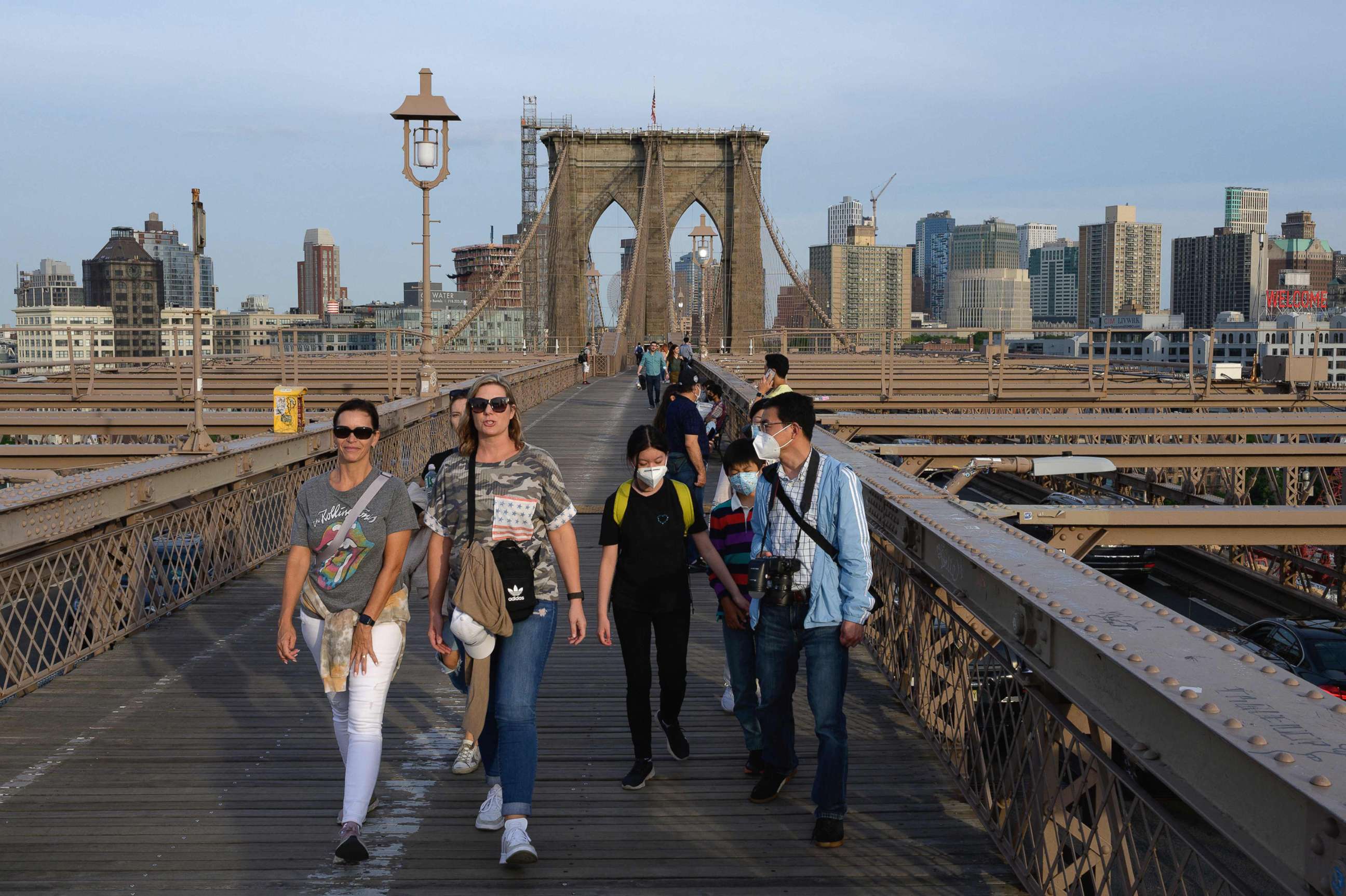 PHOTO: People walk over the Brooklyn Bridge, June 1, 2020, in New York.