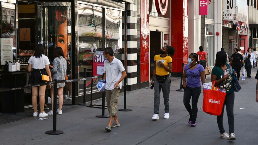 PHOTO: In this Sept. 1, 2020, file photo, people wear protective face masks while shopping along 34th Street in New York.