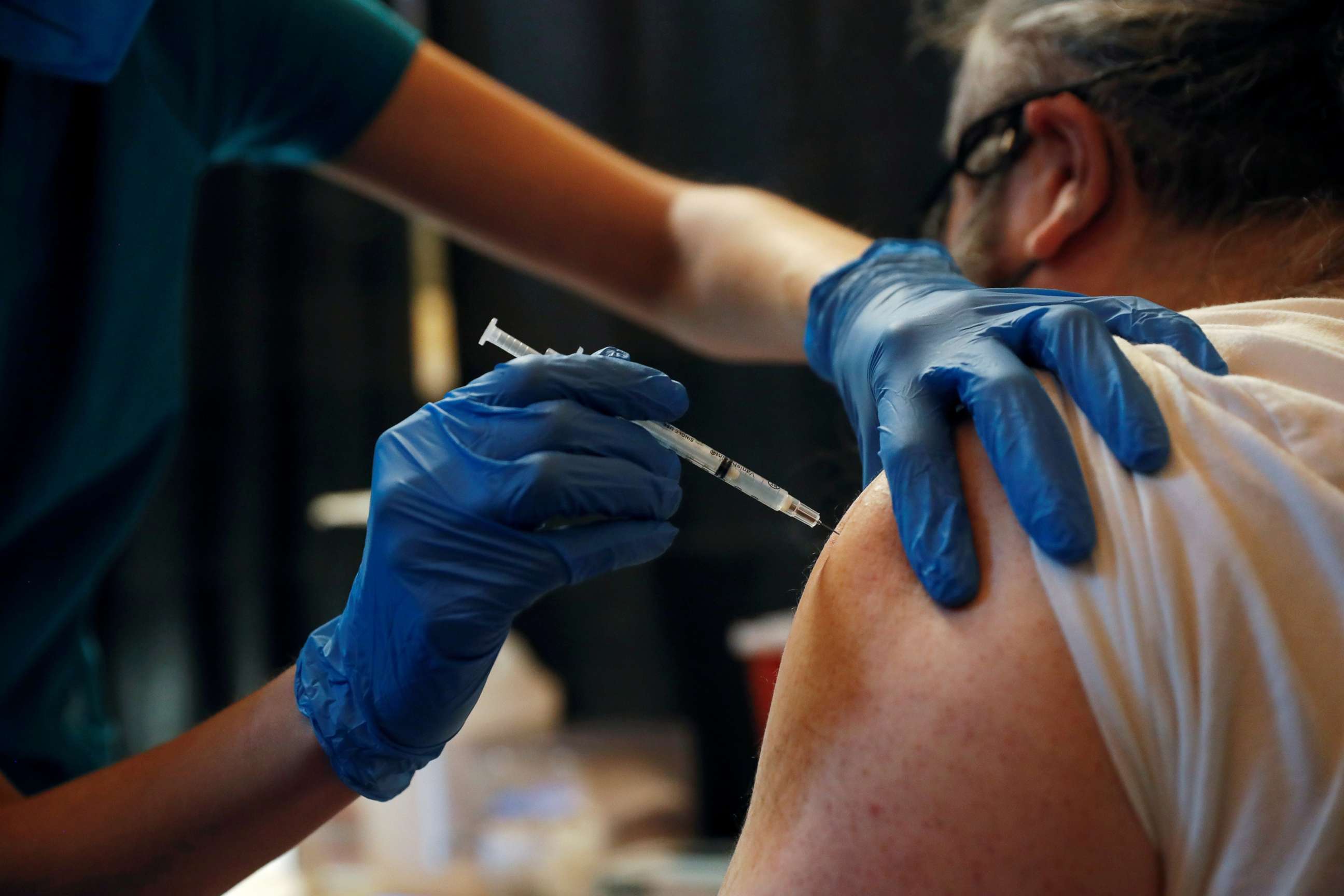 PHOTO: A Metropolitan Transportation Authority (MTA) worker receives the Pfizer COVID-19 vaccination for MTA employees at Vanderbilt Hall at Grand Central Terminal  in New York,March 10, 2021. 