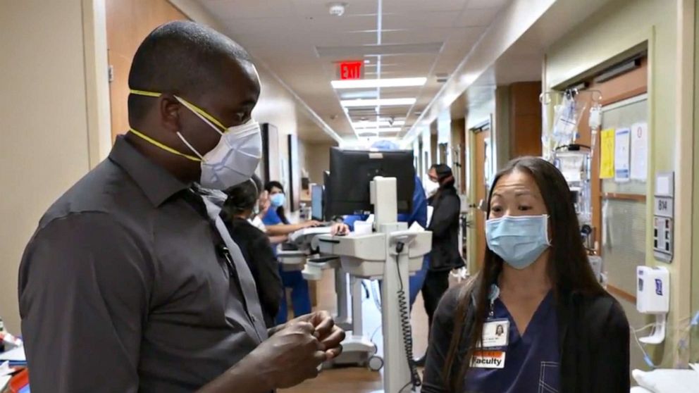 PHOTO: Dr. Shawn Nishi, an Associate Professor of Critical Care Medicine at University of Texas Medical Branch's Jennie Sealy Hospital speaks with ABC News' Marcus Moore in the hospital's intensive care unit.