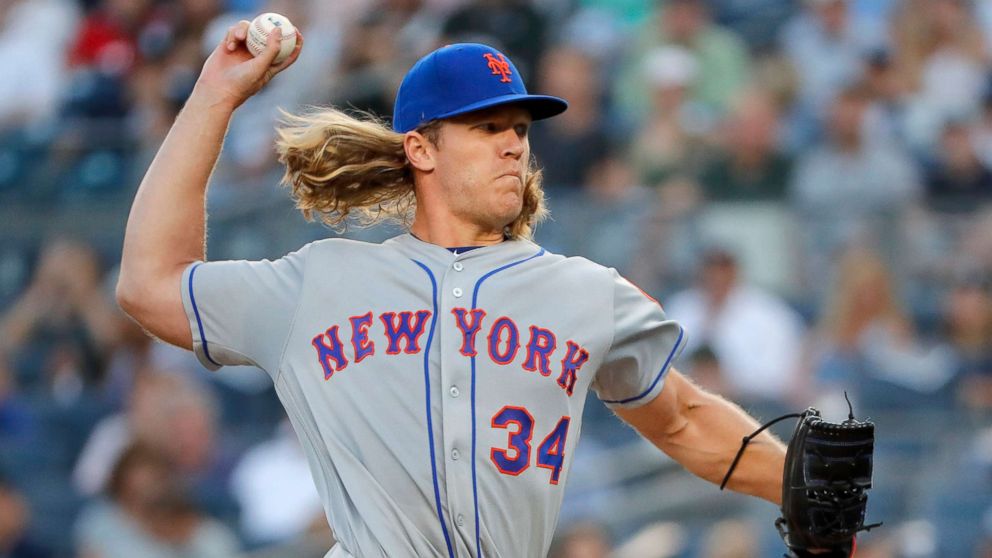 PHOTO: New York Mets starting pitcher Noah Syndergaard delivers against the New York Yankees during the first inning of a baseball game, July 20, 2018, in New York.