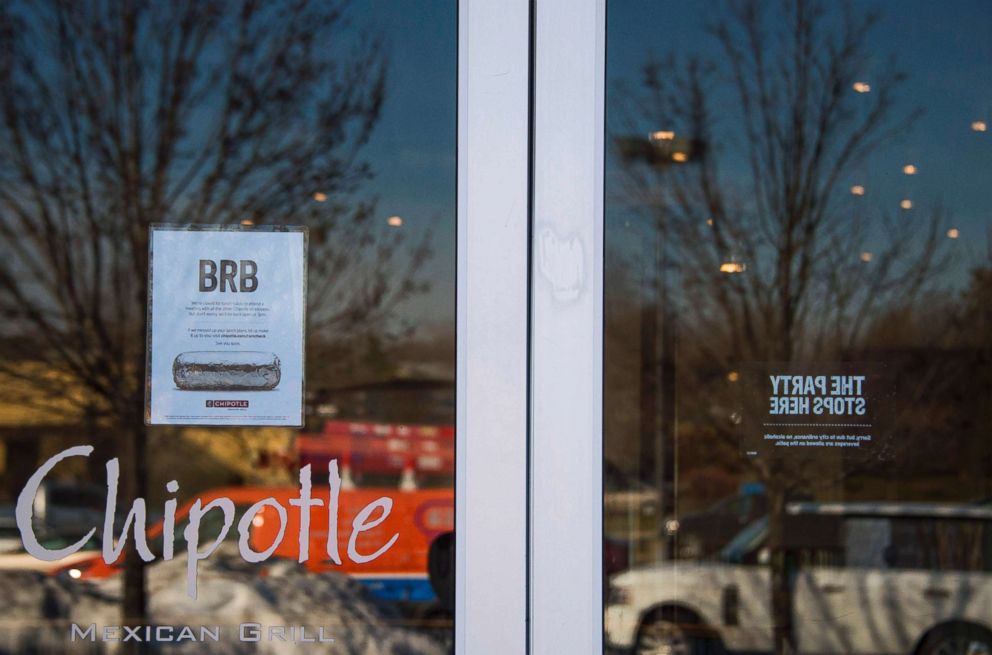 PHOTO: A sign is posted in the window of Chipotle Mexican Grill in Bowie, Md., advising customers they will be closed for a company wide meeting on Feb. 8, 2016, after  outbreaks of norovirus and E. coli.