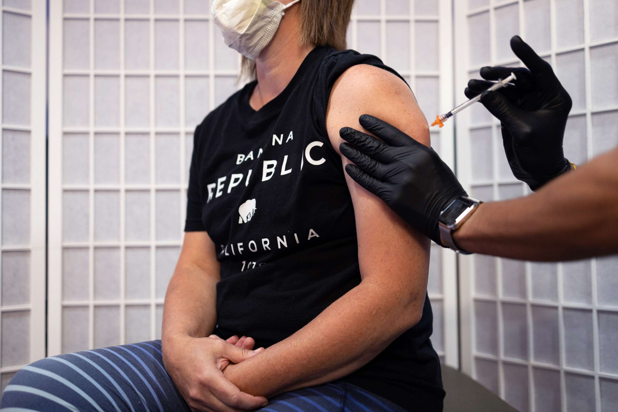 PHOTO: A healthcare worker administers a dose of the Novavax COVID-19 vaccine at a pharmacy in Schwenksville, Pa., Aug. 1, 2022.