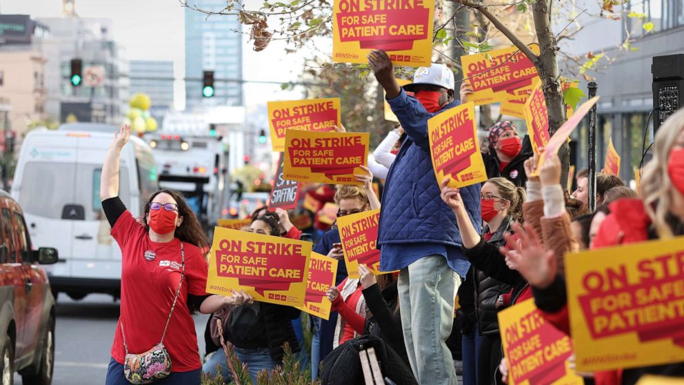 PHOTO: Sutter Health nurses and health care workers participate in a one day strike outside of the California Pacific Medical Center Van Ness Campus, April 18, 2022, in San Francisco.
