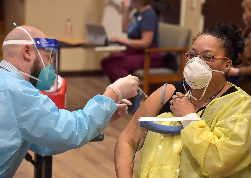 PHOTO: Pharmacist William Hallock gives the Pfizer BioNTech-COVID-19 Vaccine to a nurse at Kendel-Crosswoods Communities in Kennett Square Friday morning Jan. 8, 2021. Staff and acute care residents of the facility received the first dose of the vaccine.