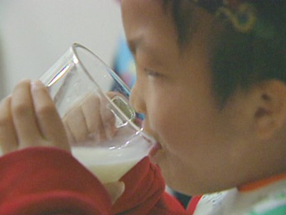 boy drinks milk
