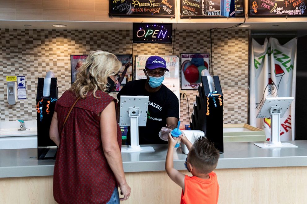 PHOTO: People visit the Destiny USA mall during the reopening, as the coronavirus (COVID-19) restrictions are eased in Syracuse, N.Y., July 10, 2020.