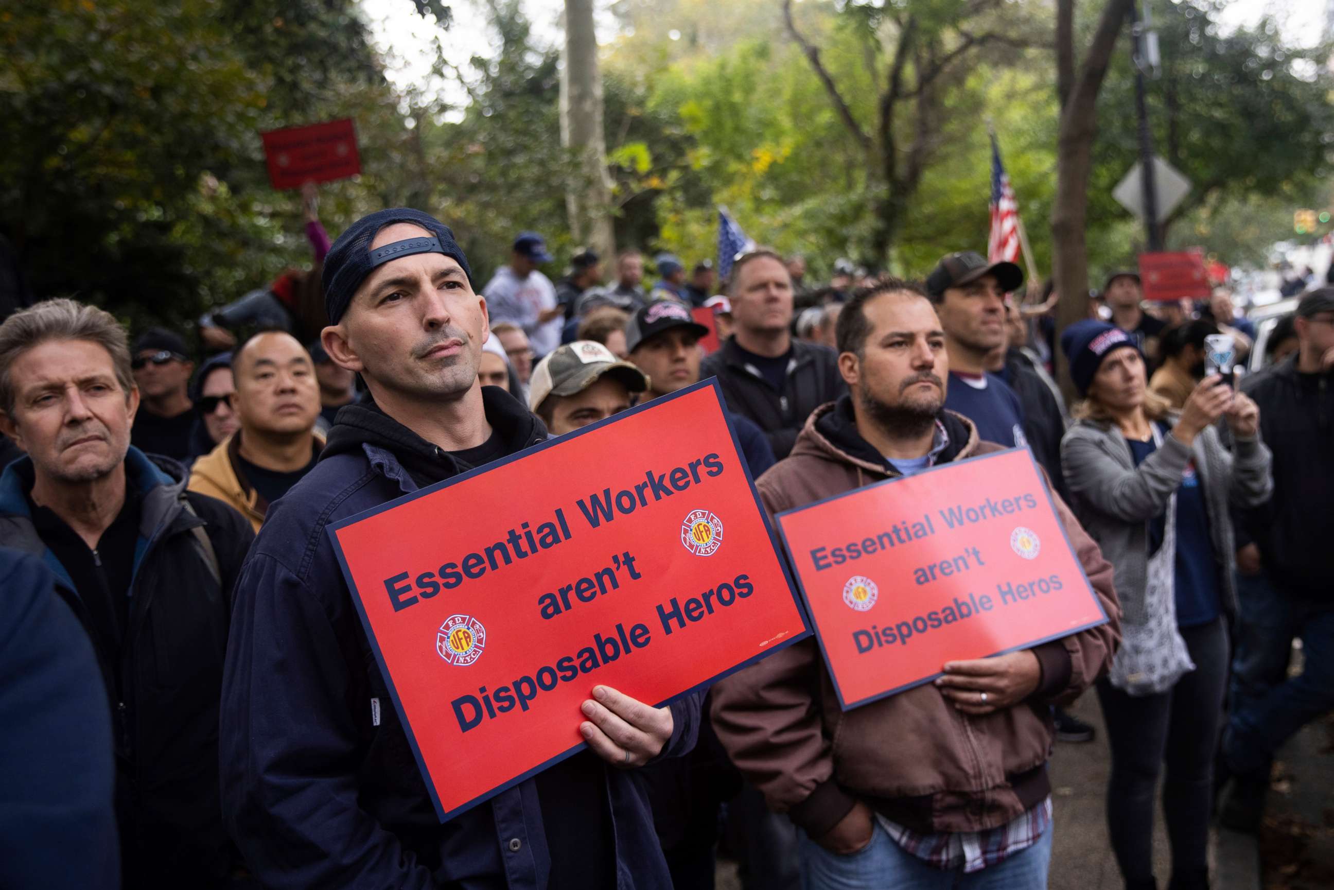 PHOTO: New York City municipal workers protest outside the Gracie Mansion Conservancy against the coming COVID-19 vaccine mandate for city workers, Oct. 28, 2021, in New York.