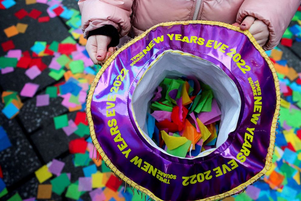 PHOTO: Jessica Martini, 7, holds a hat with pieces of confetti in it, as New Year's Eve confetti is 'flight-tested' ahead of celebrations in Times Square, New York City, Dec. 29, 2021.