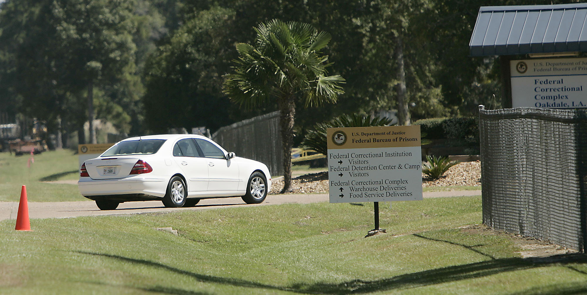 PHOTO: In this Sept. 26, 2006 file photo, a person drives through the gates of the Federal Correction Complex in Oakdale, La.