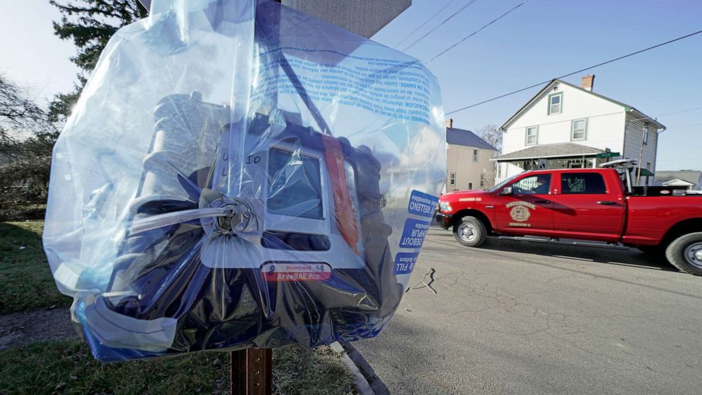 PHOTO: An air quality monitoring device hangs on a stop sign in East Palestine, Ohio, on Feb. 15, 2023, as the cleanup continues following the derailment of a Norfolk Southern Railway train carrying hazardous materials.