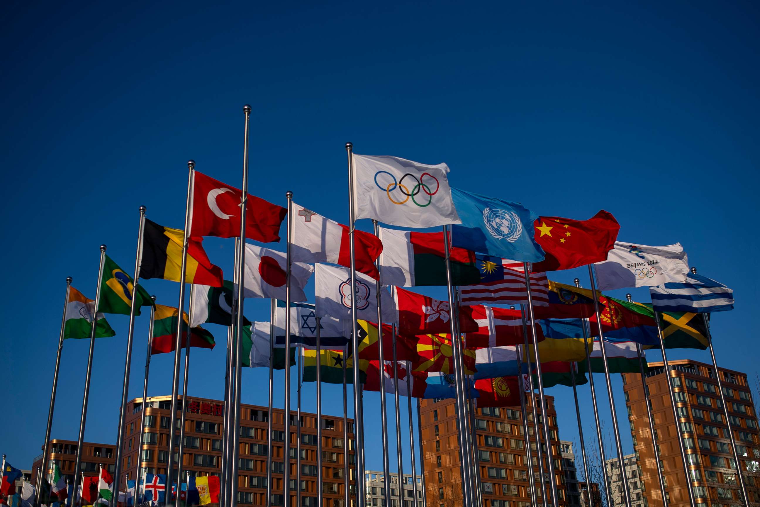 PHOTO: Flags fly outside the Olympic Village ahead of the Beijing Winter Olympics, Feb. 3, 2022 in Beijing.