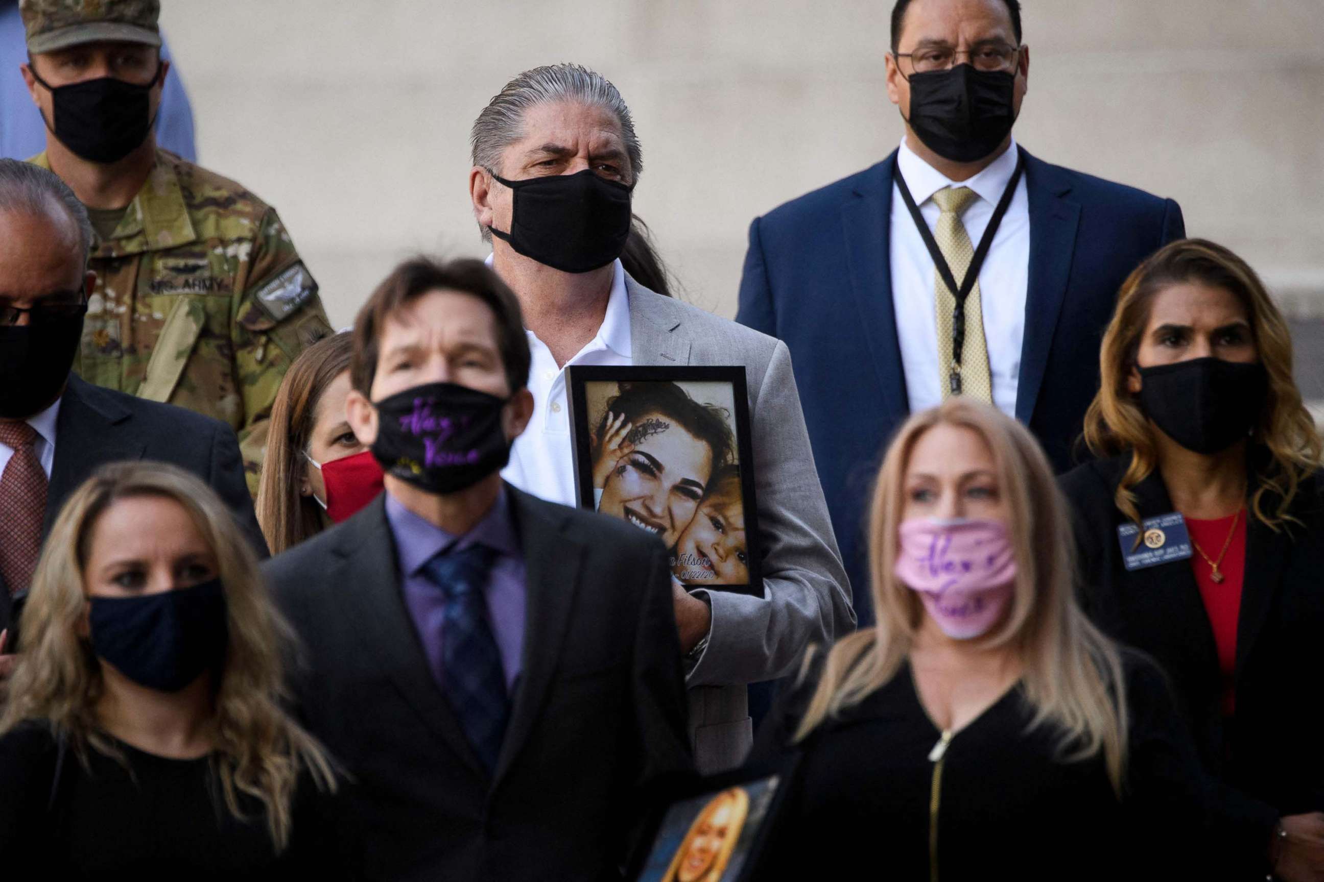 PHOTO: Steve Filson, whose daughter Jessica Filson died in January 2020 of opioids, stands with families who have had relatives die of opioids and authorities during a news conference outside the Roybal Federal Building, Feb. 24, 2021, in Los Angeles.