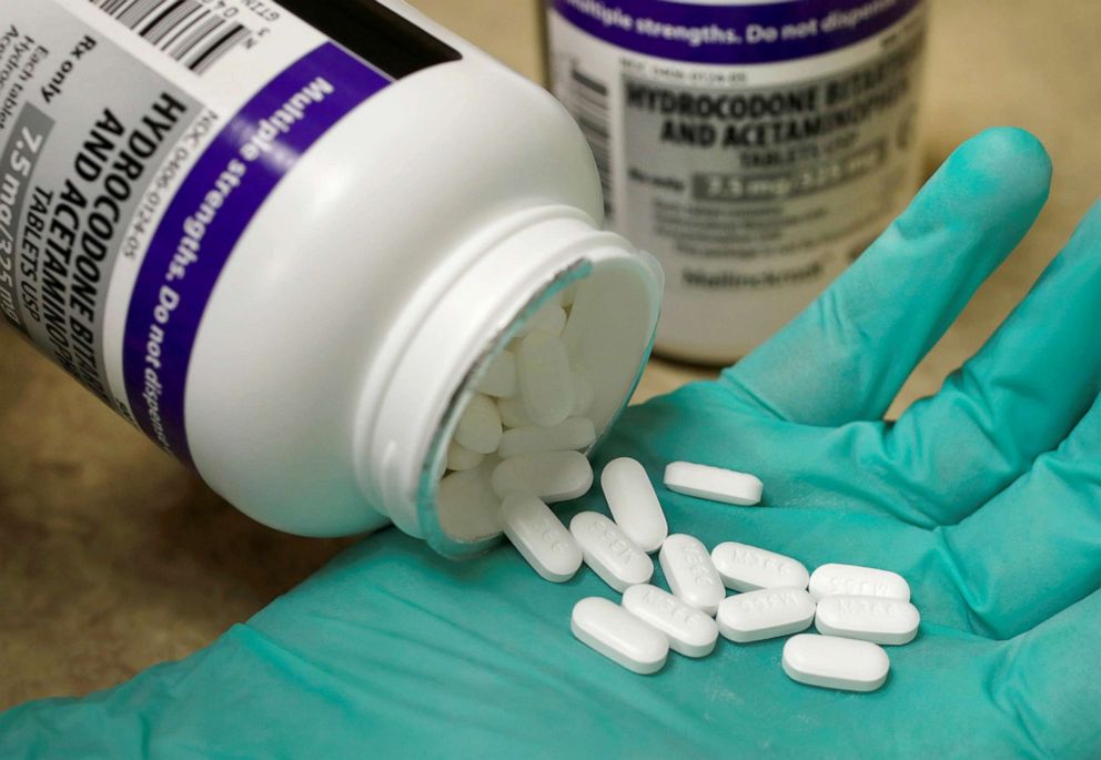 PHOTO: A pharmacist holds prescription painkiller Hydrocodine Bitartrate and Acetaminopohen, 7.5mg/325mg pills, made by Mallinckrodt at a local pharmacy, in Provo, Utah, April 25, 2017.