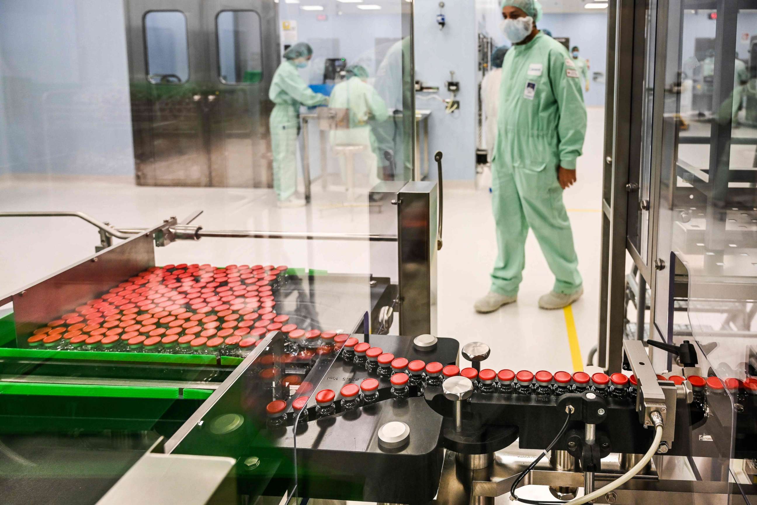 PHOTO: A laboratory technician supervises capped vials during filling and packaging tests for the large-scale production and supply of the AstraZeneca/Oxford COVID-19 vaccine candidate at a manufacturing facility in Anagni, Italy, on Sept. 11, 2020.