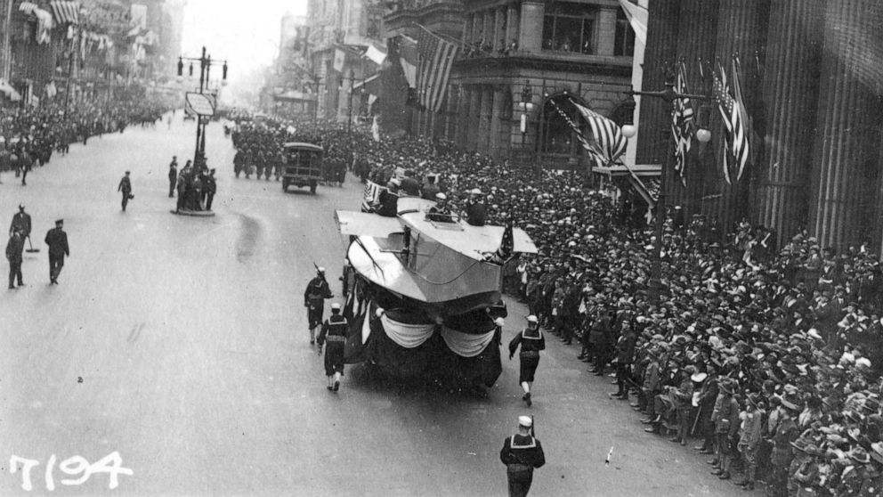 PHOTO: In this Sept. 28, 1918, photo provide by the U.S. Naval History and Heritage Command the Naval Aircraft Factory float moves south on Broad Street escorted by Sailors during the a parade meant to raise funds for the war effort, in Philadelphia.