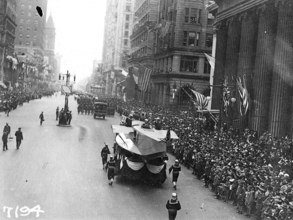 PHOTO: In this Sept. 28, 1918, photo provide by the U.S. Naval History and Heritage Command the Naval Aircraft Factory float moves south on Broad Street escorted by Sailors during the a parade meant to raise funds for the war effort, in Philadelphia.