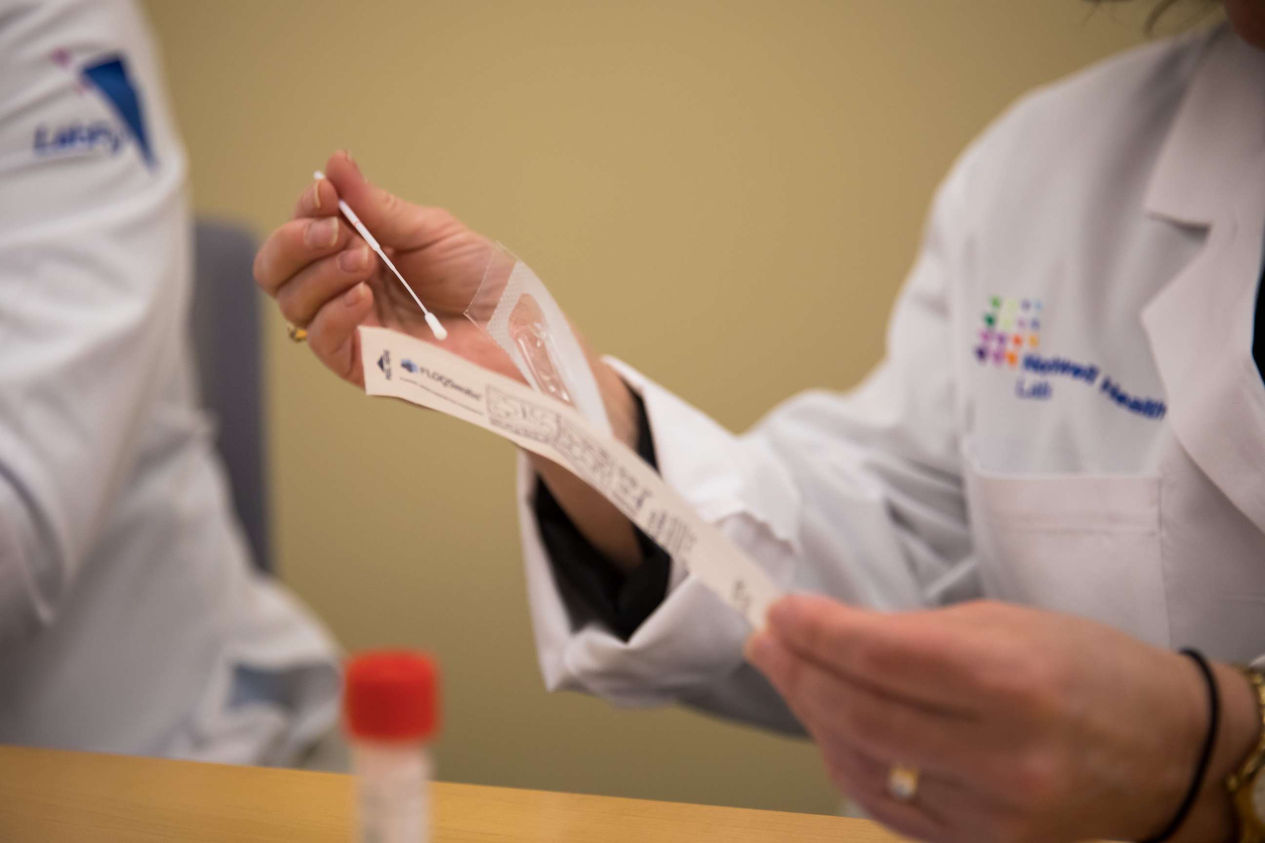 PHOTO: A pathologist holds a nasal swab from a COVID-19 test kit at the Core Lab in Northwell Health's Center for Advanced Medicine in Lake Success, New York, March 4, 2020.