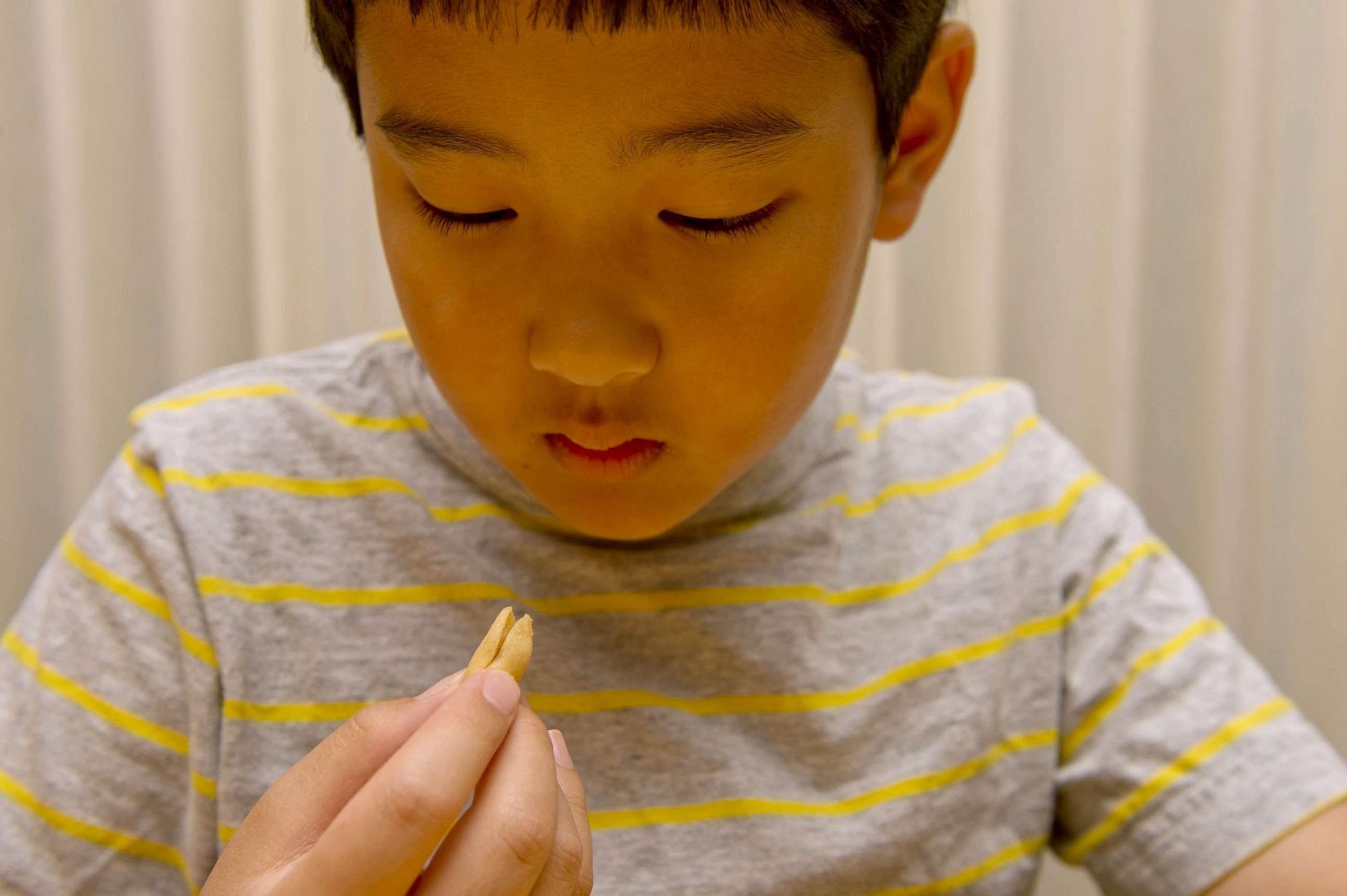 PHOTO:Michael Lee takes his peanut-allergy treatment: consuming a precisely measured dose of peanuts. The program began with a tiny amount of peanut powder mixed into liquids or soft foods in Sacramento, Calif., June 19, 2014.