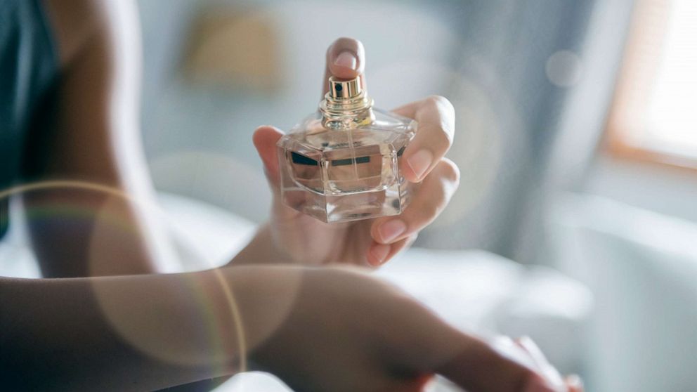 PHOTO: A woman spray perfume in this stock photo.