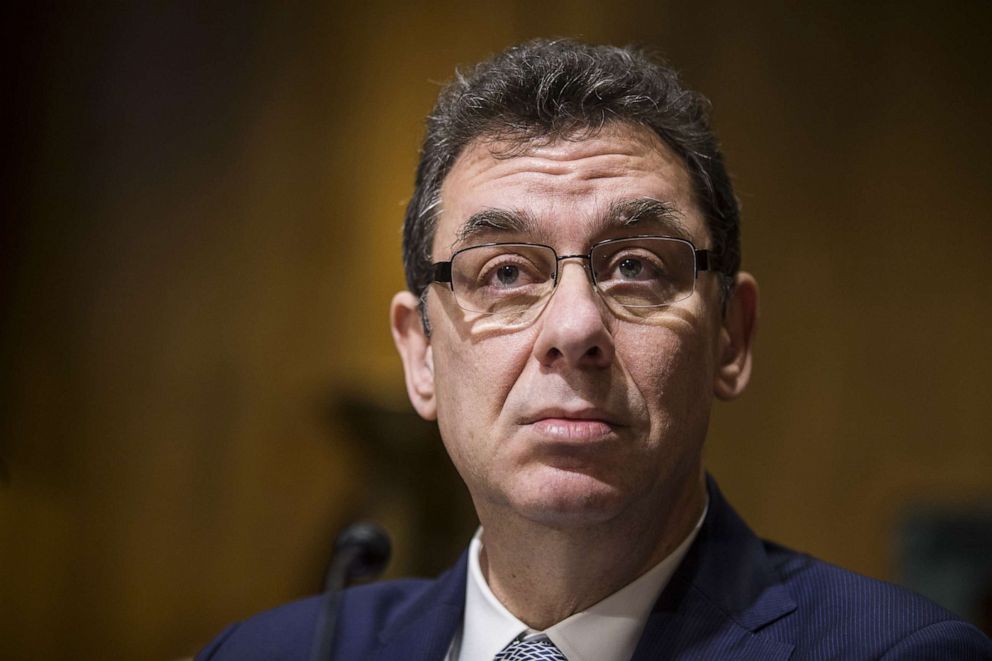 PHOTO: Albert Bourla, chief operating officer and chief executive officer of Pfizer Inc., listens during a Senate Finance Committee hearing on drug pricing on Capitol Hill, Feb. 26, 2019.