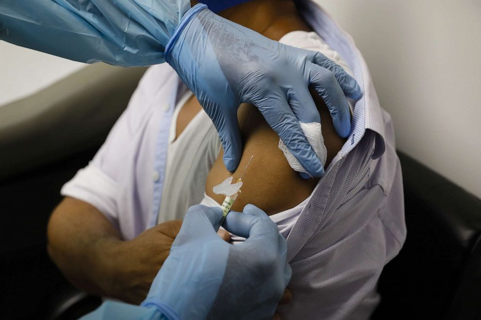 PHOTO: Residents participate in a Pfizer COVID-19 vaccine clinical trial in Hollywood, Fla., Sept. 9, 2020.