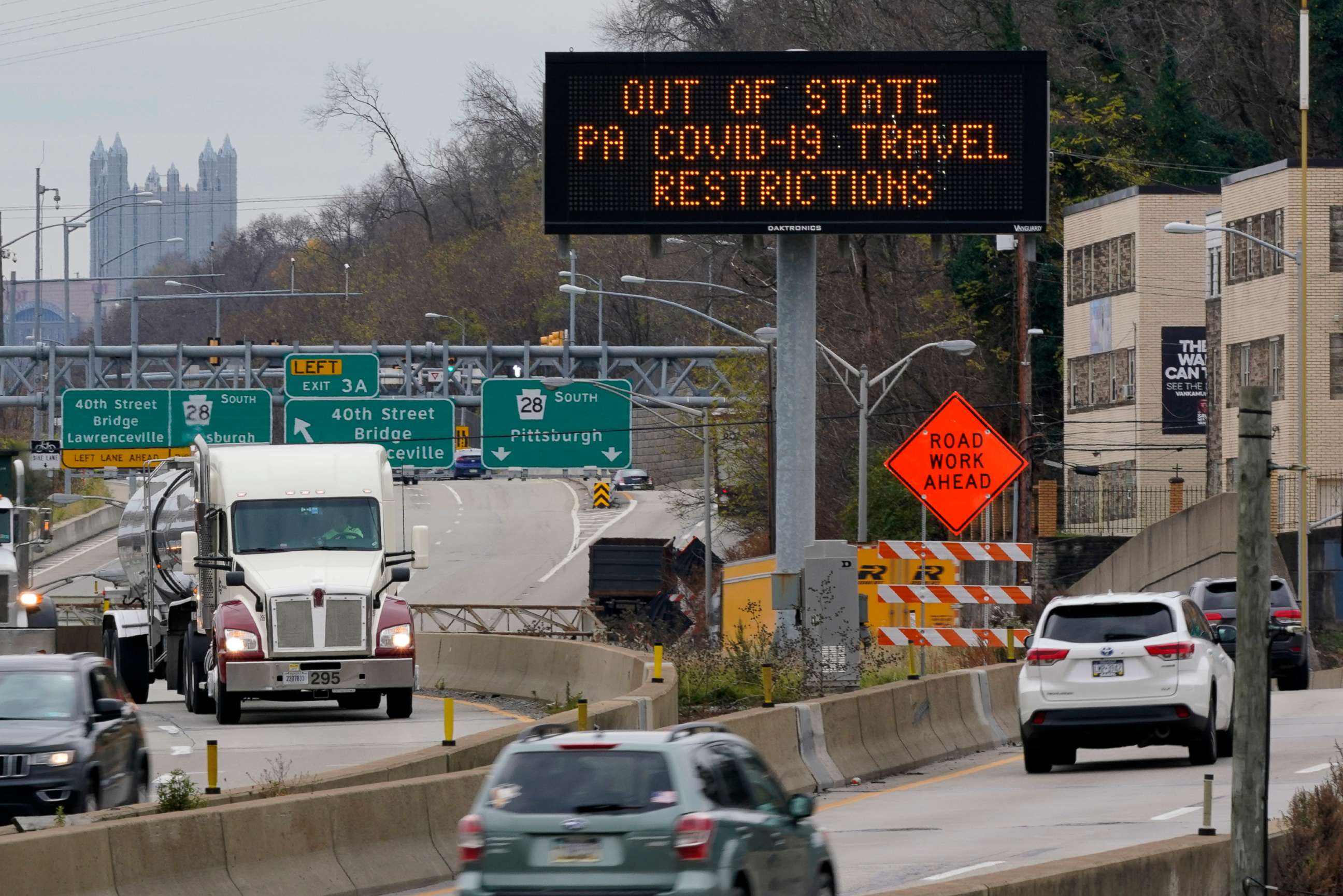PHOTO: A sign over route 28 north of downtown Pittsburgh alerts out of state motorists to Pennsylvania Covid-19 travel restrictions on Nov. 24, 2020.