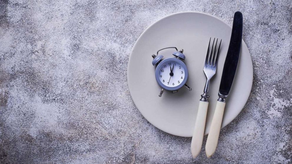 PHOTO: An alarm clock with silverware on a plate are pictured in this undated stock photo. 