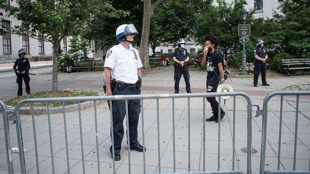 PHOTO: Police officers are shown on June 15, 2020, during a Black Lives Matter Protest near NYPD headquarters in New York.